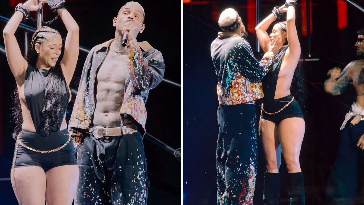 Chris Brown geeft hitsige fan een pikante lapdance op het podium